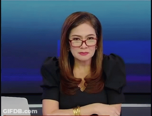 Woman Sitting In Chair With Text The Voice GIF