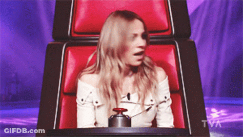 Woman Sitting In Chair With TVA Logo GIF