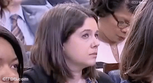 Woman Sitting In Courtroom Row GIF