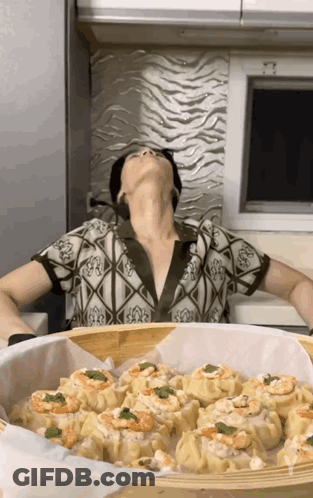 Woman Sitting In Front Of Basket Of Food GIF