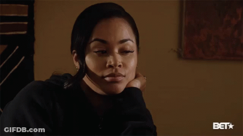 Woman Sitting In Front Of BET Logo GIF