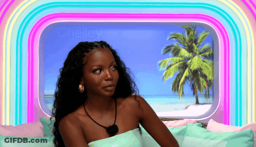 Woman Sitting In Front Of Cheley Window GIF
