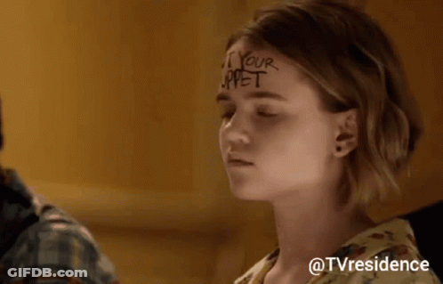 Woman Sitting In Front Of Crowd With Caption @Tvresidence GIF