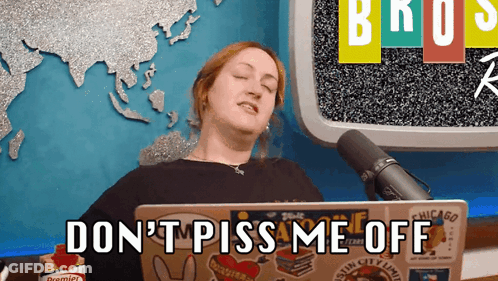 Woman Sitting In Front Of Do Not Piss Me Off Laptop GIF