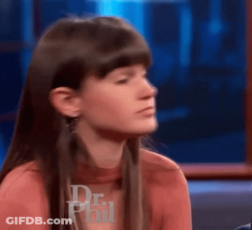 Woman Sitting In Front Of Dr Phil Logo GIF