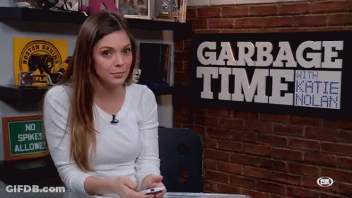 Woman Sitting In Front Of Garbage Time Sign GIF