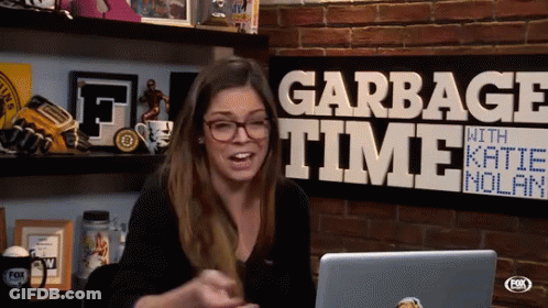 Woman Sitting In Front Of Garbage Time With Katie Nolan Sign GIF