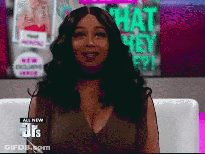 Woman Sitting In Front Of Hey Poster GIF