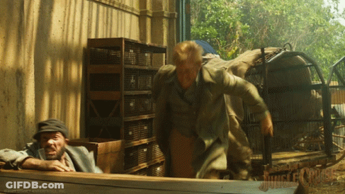 Woman Sitting In Front Of Jungle Cruise Sign GIF