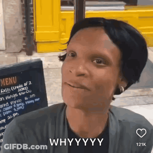 Woman Sitting In Front Of Menu Board Saying Whyyyy GIF