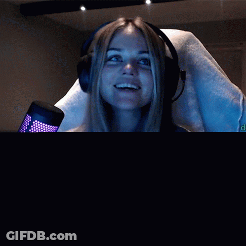 Woman Sitting In Front Of Microphone Saying What The Hell GIF