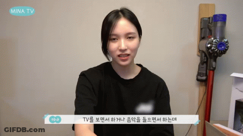 Woman Sitting In Front Of Mina TV Vacuum GIF