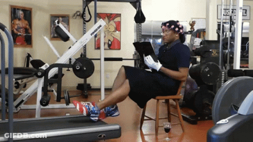 Woman Sitting In Front Of Powerline Machine GIF