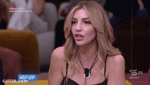 Woman Sitting In Front Of Screen Saying Gfvip GIF