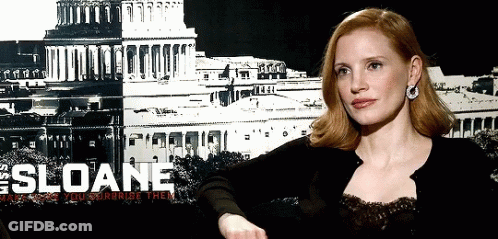 Woman Sitting In Front Of Sloane Poster GIF