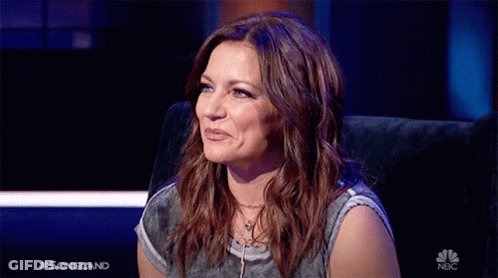 Woman Sitting In Front Of Songland Screen GIF