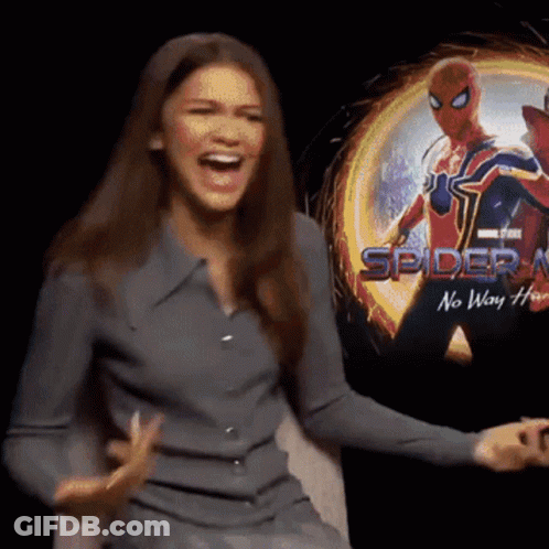 Woman Sitting In Front Of Spider-Man No Way Home Poster GIF