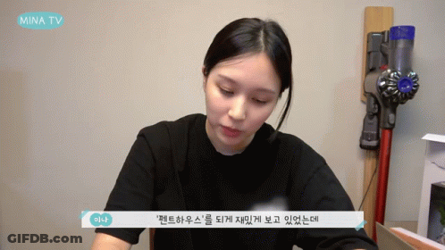 Woman Sitting In Front Of Vacuum GIF