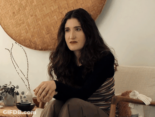 Woman Sitting In Front Of Woven Basket GIF
