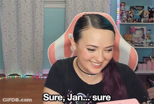 Woman Sitting In Pink And White Chair Saying Sure Jan GIF