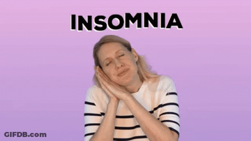 Woman Sitting In Pink And White Chair Says Sure Jan GIF