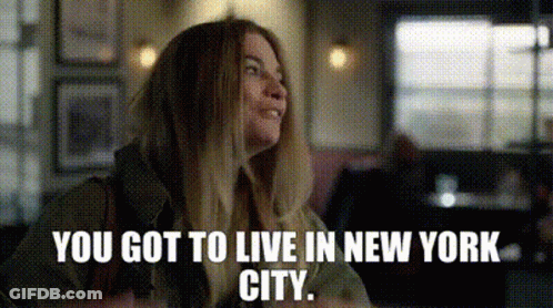 Woman Sitting In Restaurant With NYC Quote GIF