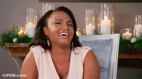 Woman Sitting Laughing GIF