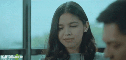 Woman Sitting Next To Man With Mainegif Logo GIF