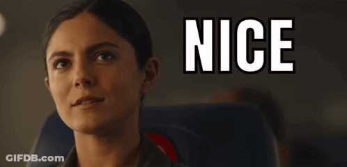 Woman Sitting On Airplane With Nice Background GIF