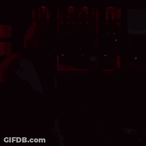 Woman Sitting On Bar Stool GIF