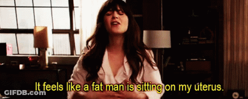 Woman Sitting On Bed Feeling Pressure GIF