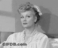 Woman Sitting On Bed In Robe GIF