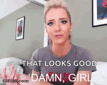 Woman Sitting On Bed Making Funny Face GIF