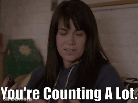 Woman Sitting On Bed Saying You're Counting A Lot GIF