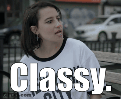 Woman Sitting On Bench With Classy Shirt GIF
