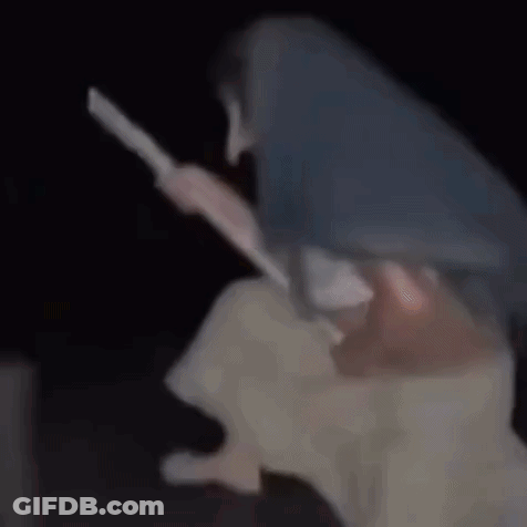 Woman Sitting On Broom In Darkness GIF