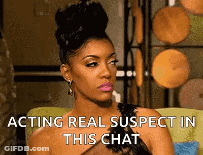 Woman Sitting On Couch Acting Suspect GIF