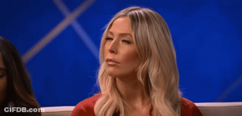 Woman Sitting On Couch Eyes Closed Mouth Open GIF