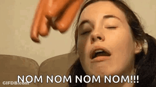 Woman Sitting On Couch Eyes Closed Pointing At Face GIF