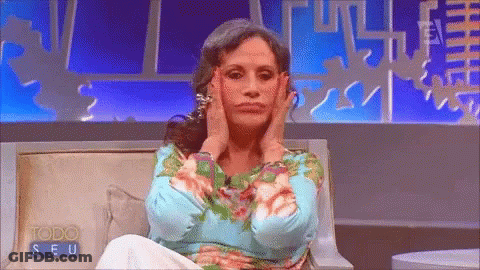 Woman Sitting On Couch Hands On Face Todo Seu Sign GIF