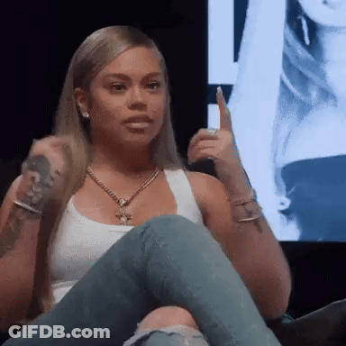 Woman Sitting On Couch Holding Microphone GIF