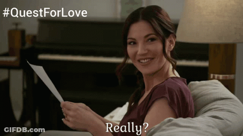 Woman Sitting On Couch Holding Paper Really GIF
