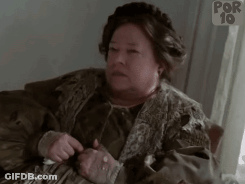 Woman Sitting On Couch In Front Of Por 10 Sign GIF