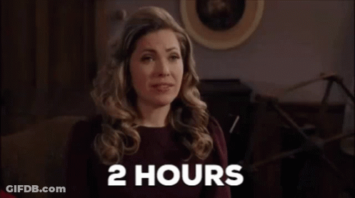 Woman Sitting On Couch Saying 2 Hours GIF