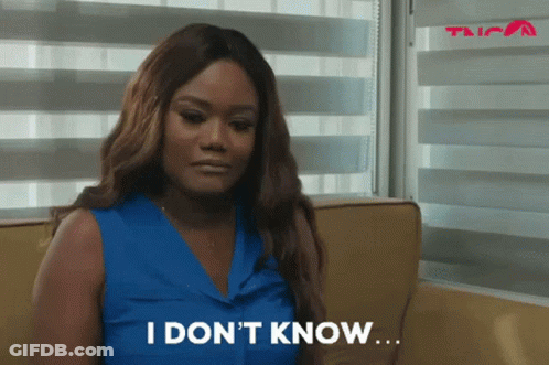 Woman Sitting On Couch Saying I Don't Know GIF