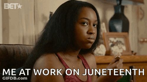 Woman Sitting On Couch Saying Me At Work On Juneteenth GIF
