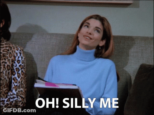 Woman Sitting On Couch Saying Oh Silly Me GIF