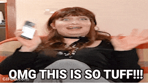 Woman Sitting On Couch Saying OMG GIF