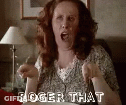 Woman Sitting On Couch Saying Roger That GIF