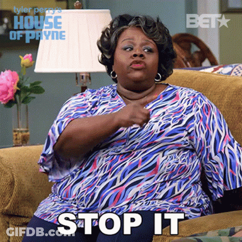 Woman Sitting On Couch Saying Stop It GIF